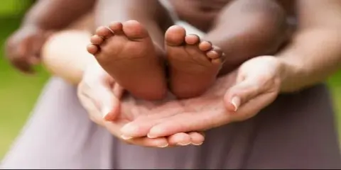 Mother Holding a Child