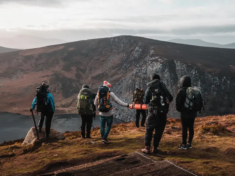 Students looking at a mountain landscape