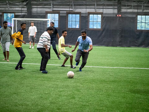 students playing soccer