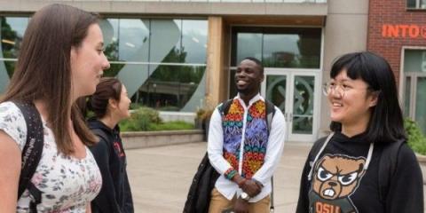Three students talking
